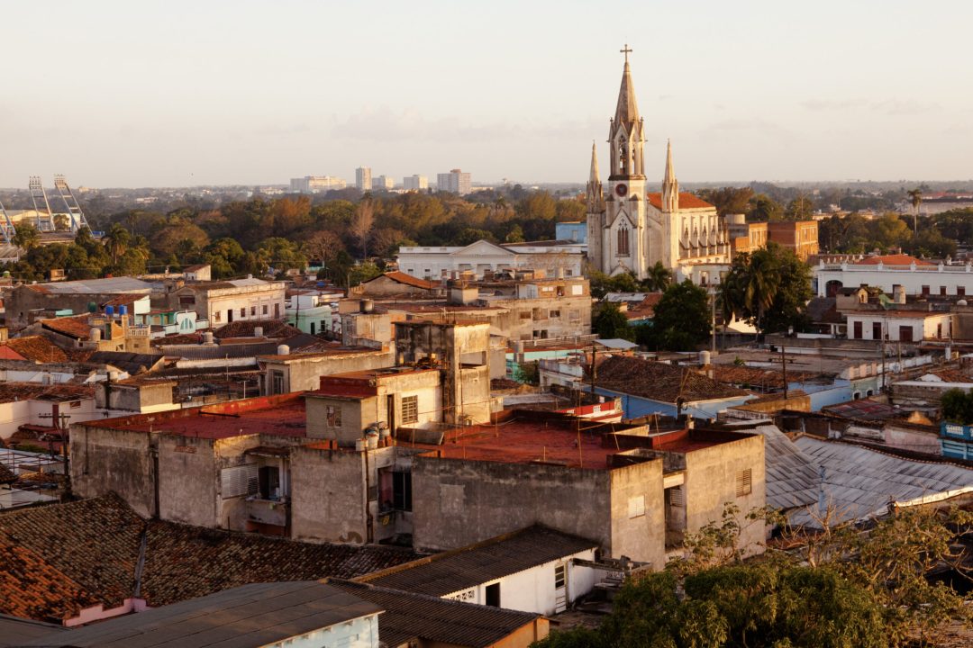 Camaguey, Cuba - December 19, 2016:  Camaguey (UNESCO World Heritage Centre) from above. View of the roofs and the  Sacred Heart of Jesus Cathedral (Iglesia del Sagrado Corazon de Jesus). (aerial view)